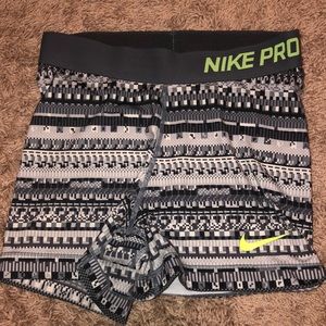 Grey and neon yellow nike pros